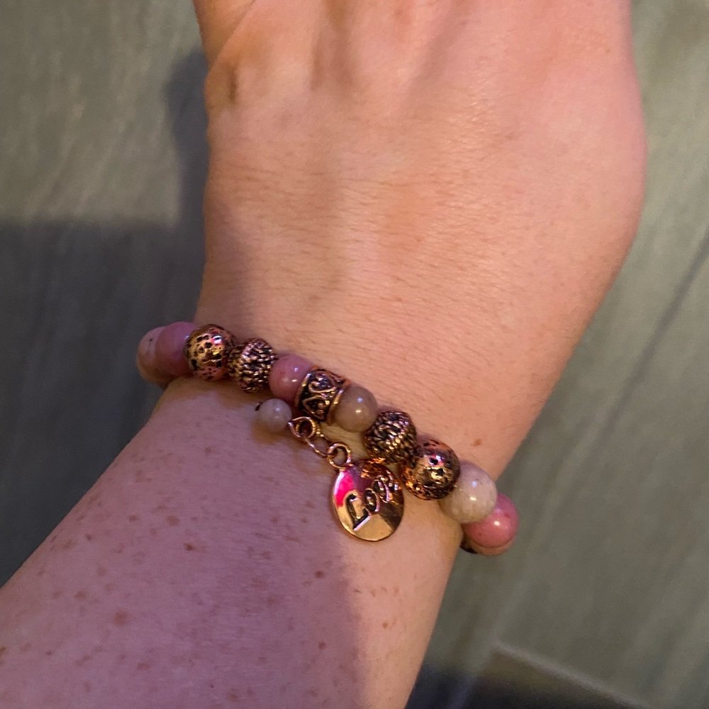 Pink stone beaded bracelet. Never worn (besides taking the photo).